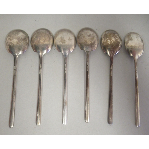 24 - A set of six silver teaspoons; a set of six bean and coffee spoons; and another set of six of plain ... 