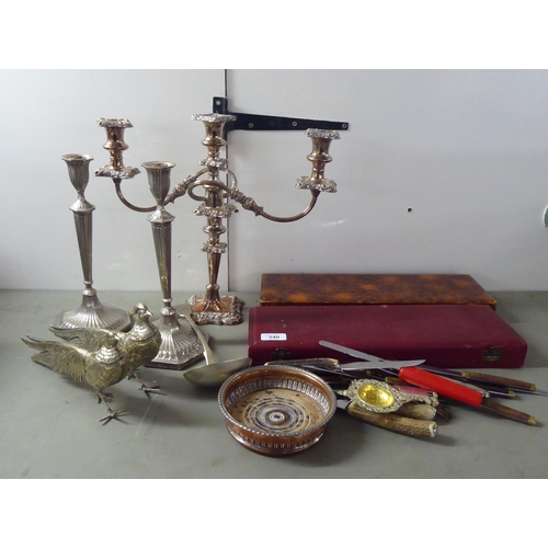 240 - Silver plated and white metal tableware: to include a pair of candlesticks  12