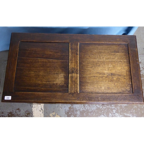 244 - A 1930s Gothic inspired stained oak blanket chest with straight sides and a hinged lid, over a tri-p... 