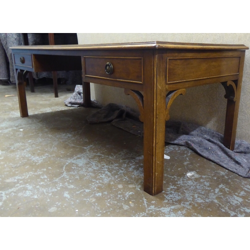 249 - A 20thC Georgian design mahogany framed coffee table, fashioned as a two drawer kneehole desk, raise... 