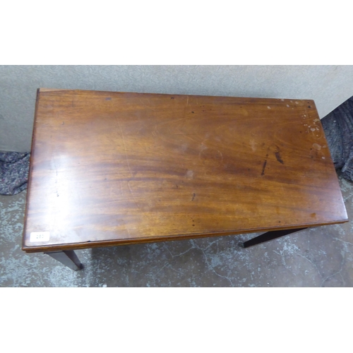 253 - A Regency mahogany foldover card table, raised on square legs  29