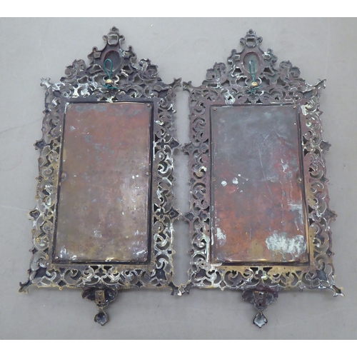 269 - A pair of cast brass framed ornate mirrors  19