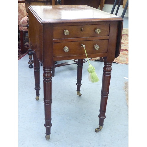 274 - An early 19thC mahogany Pembroke work table with two lockable end drawers and facsimiles on the reve... 