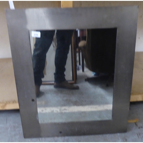 278 - A modern mirror, set in an industrially inspired steel frame  23