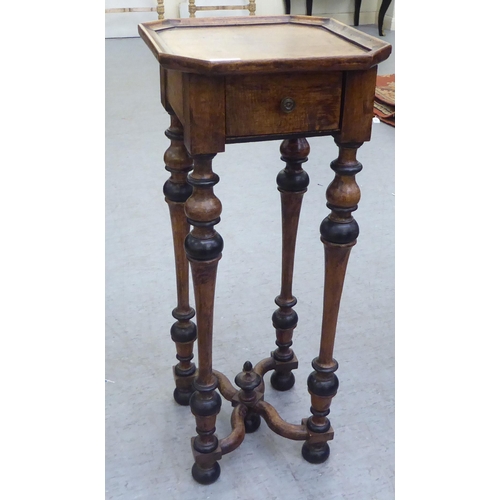 282 - An early 20thC Continental stained and ebonised pine occasional table, the top with canted corners, ... 