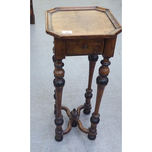 282 - An early 20thC Continental stained and ebonised pine occasional table, the top with canted corners, ... 