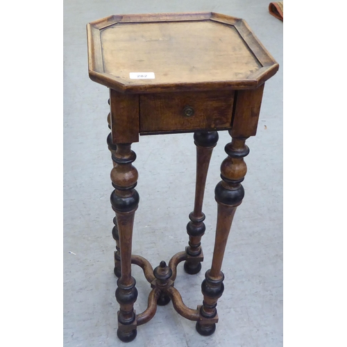 282 - An early 20thC Continental stained and ebonised pine occasional table, the top with canted corners, ... 