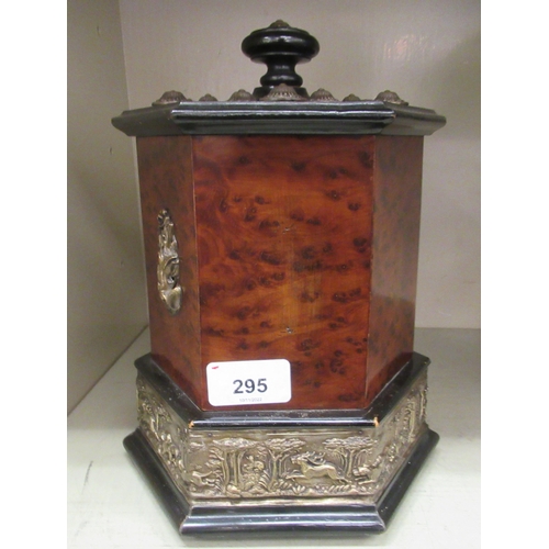 295 - An early 20thC Continental walnut veneered cigar dispenser of hexagonal form, incorporating an impre... 