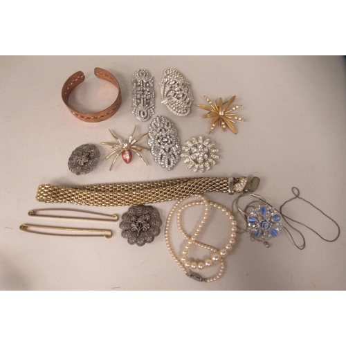 31 - Items of personal ornament: to include paste brooches, one fashioned as a spider 