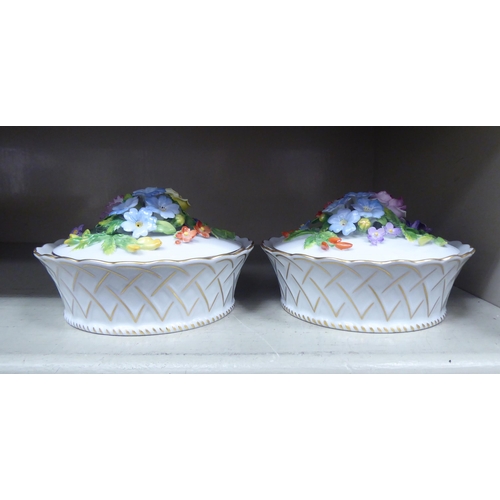 316 - A pair of Dresden porcelain covered basket dishes, decorated with encrusted flora and gilding  ... 