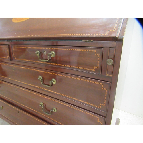 328 - An Edwardian style bureau with string inlaid, marquetry, satinwood and ebony decoration, the fall fr... 