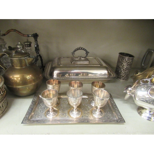 335 - Silver plated and other tableware: to include a sauce boat and other pouring vessels