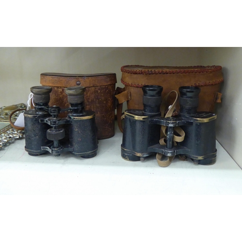 337 - A pair of Kershaw World War II period military binoculars; and a similar pair  both cased