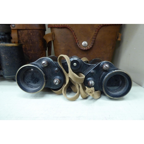 337 - A pair of Kershaw World War II period military binoculars; and a similar pair  both cased