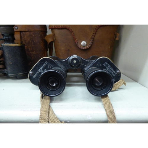 337 - A pair of Kershaw World War II period military binoculars; and a similar pair  both cased