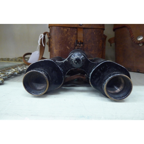 337 - A pair of Kershaw World War II period military binoculars; and a similar pair  both cased