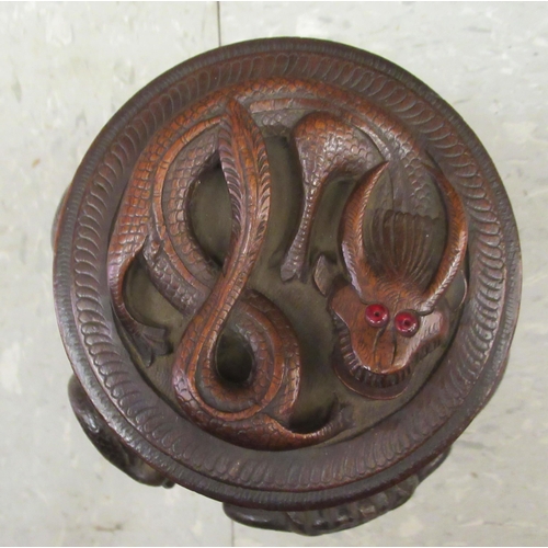 343 - An Oriental carved wooden tobacco jar and cover, decorated with dragons  7