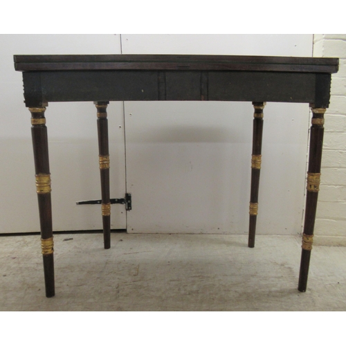 363 - An early 19thC rosewood and crossbanded satinwood, D-shape card table, the foldover top revealing a ... 