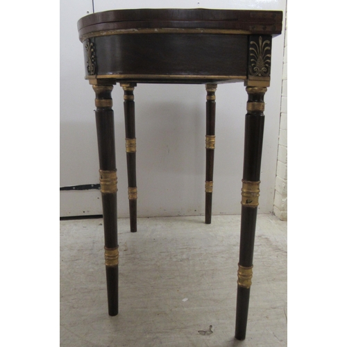 363 - An early 19thC rosewood and crossbanded satinwood, D-shape card table, the foldover top revealing a ... 