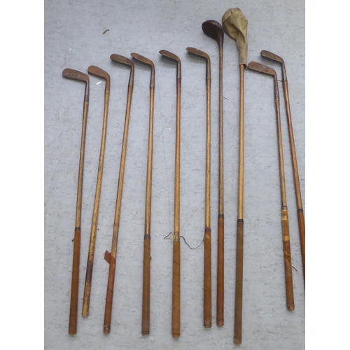 369 - Ten Hickory shaft golf clubs: to include examples by BH McRae, Flackwell Heath  stamped SA Mashie