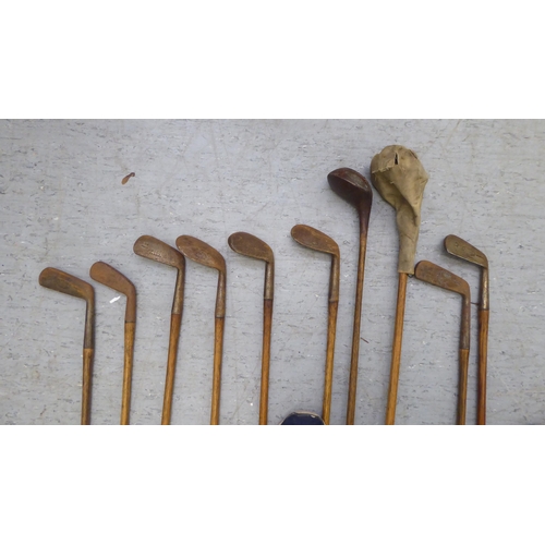 369 - Ten Hickory shaft golf clubs: to include examples by BH McRae, Flackwell Heath  stamped SA Mashie