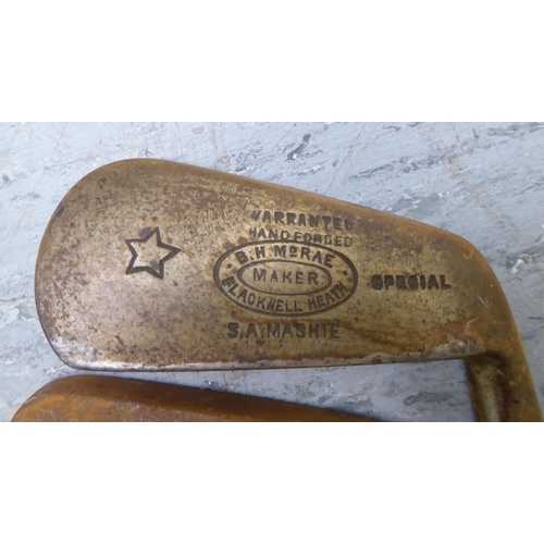 369 - Ten Hickory shaft golf clubs: to include examples by BH McRae, Flackwell Heath  stamped SA Mashie