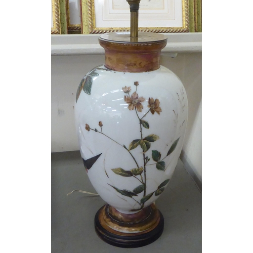 378 - An early 20thC overpainted glass table lamp, decorated with birds in flight  22