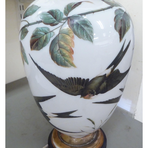 378 - An early 20thC overpainted glass table lamp, decorated with birds in flight  22