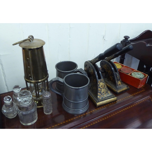 380 - A mixed lot: to include a 1930s three piece silver backed dressing table set  indistinct Birmin... 