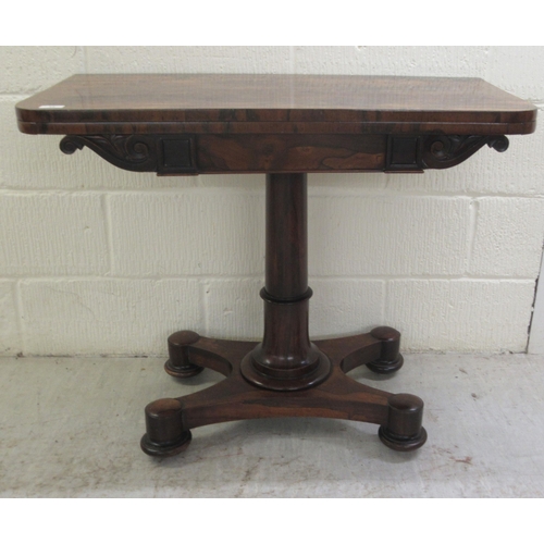 387 - An early 19thC rosewood card table, the rotating foldover top enclosing a green baize lined interior... 