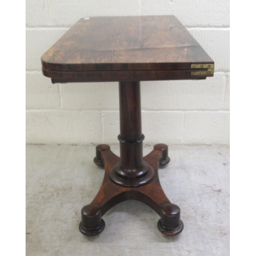 387 - An early 19thC rosewood card table, the rotating foldover top enclosing a green baize lined interior... 