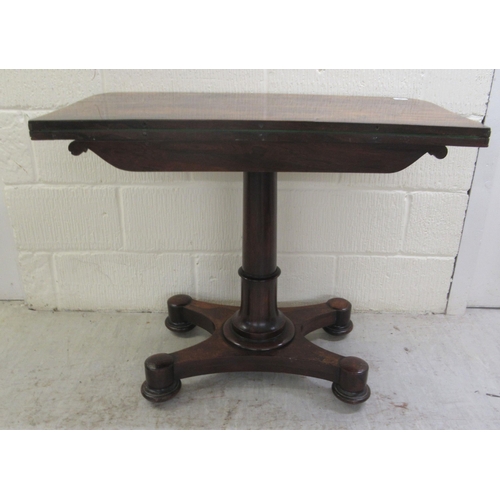 387 - An early 19thC rosewood card table, the rotating foldover top enclosing a green baize lined interior... 