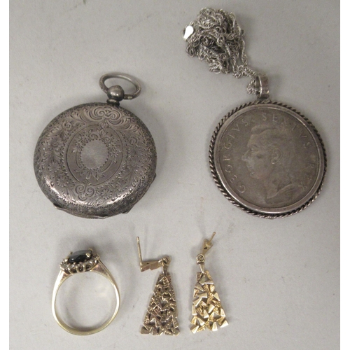 39 - Personal items: to include an engraved silver cased fob watch; and a pair of yellow metal pendant ea... 