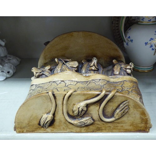 390 - Decorative ceramics: to include a 19thC Staffordshire pottery figure with a lion  7