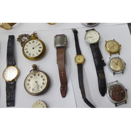 393 - Watches: to include a 1930s gun metal cased pocket watch, faced by an Arabic dial