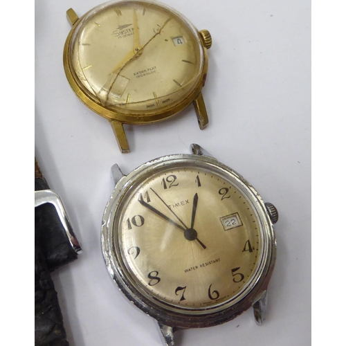 393 - Watches: to include a 1930s gun metal cased pocket watch, faced by an Arabic dial