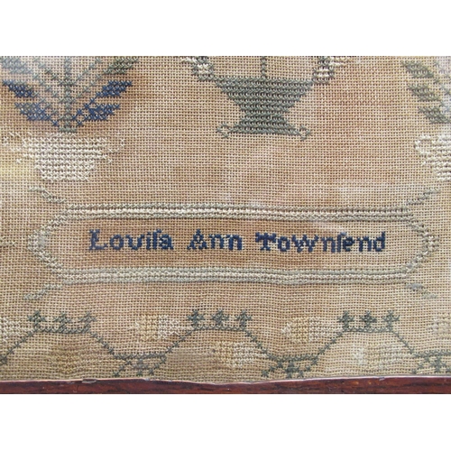 399 - An early 19thC sampler, worked in green and blue cross-stitch, by one Louisa Ann Townsend with four ... 