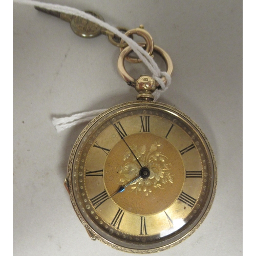 41 - An 18ct gold cased pocket watch with bright-cut engraved ornament, faced by an engine turned and flo... 