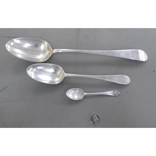 412 - Silver flatware: to include a basting spoon and a  medallion  mixed marks