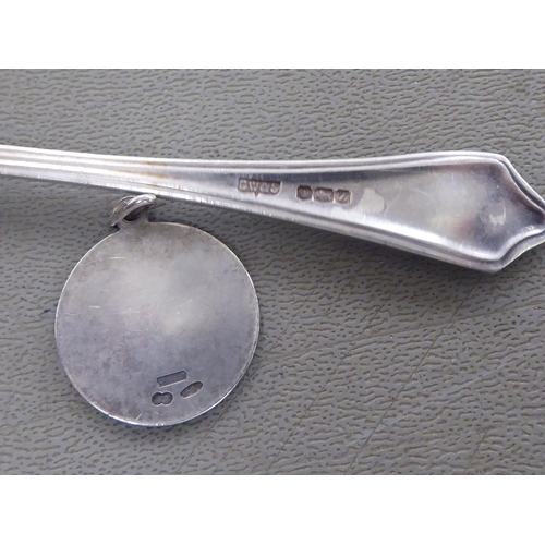 412 - Silver flatware: to include a basting spoon and a  medallion  mixed marks