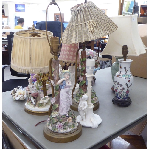 415 - 19thC and later porcelain and other table lamps of varying styles  largest 13