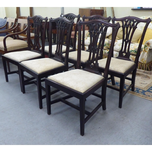 416 - A set of six early 20thC Georgian style chairs, each with an arched back, over a pierced vase design... 