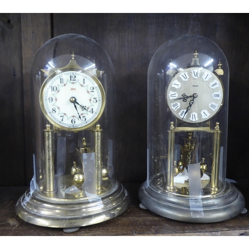 52 - Four 20thC torsion mantel timepieces; variously faced by Arabic and Roman dials, in circular plinths... 