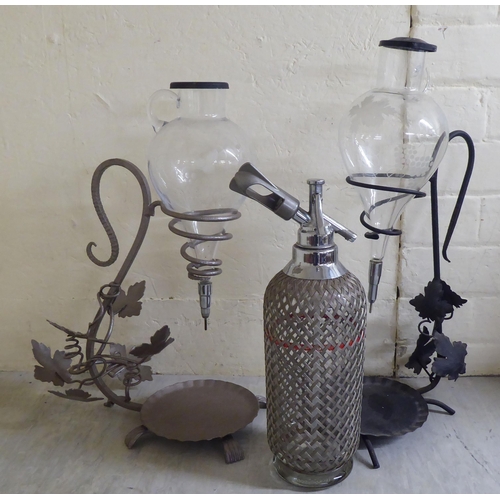 53 - Objects of purpose and desire: to include The Wolf Safety Lamp Co miners lamp; two sparklet glass so... 