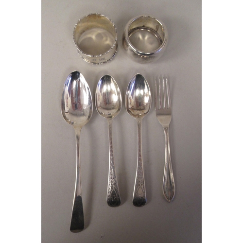 54 - Silver items, viz. two dissimilar napkin rings; and four items of flatware  mixed marks