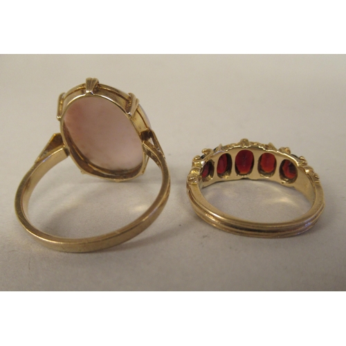 55 - A 9ct gold claw set cameo portrait ring; and a 9ct gold and garnet set dress ring 