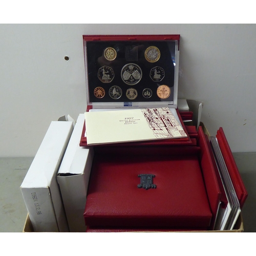 64 - Seven various Royal Mint British proof coin sets  cased