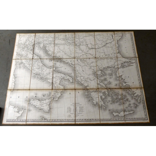 71 - A set of four early 20thC French printed linen backed road maps of Europe, folding into a card sleev... 