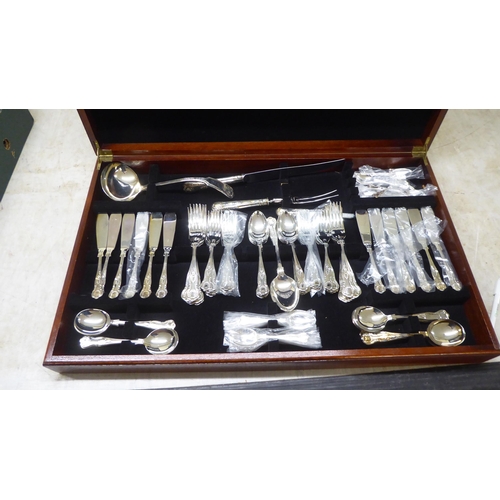 78 - A canteen of silver plated Kings pattern cutlery and flatware, in a fitted mahogany finished table t... 