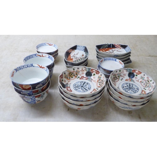 79 - 20thC Japanese porcelain tableware, mainly decorated with repeating patterns, flora and landscapes